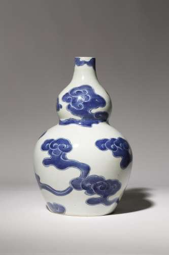 A RARE JAPANESE ARITA BLUE AND WHITE SAKE BOTTLE, TOKKURI EDO PERIOD, 18TH CENTURY Shaped as a