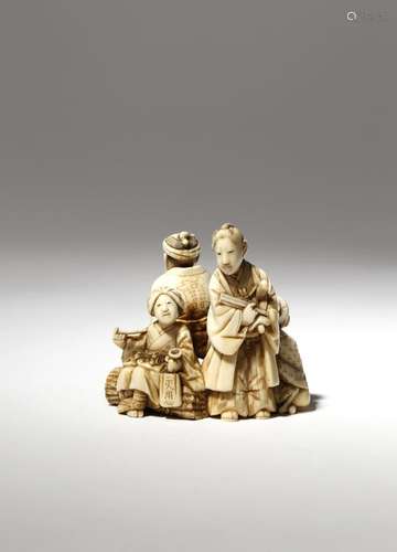 A JAPANESE IVORY CARVING, OKIMONO MEIJI PERIOD, 19TH CENTURY Depicting a group of four figures,