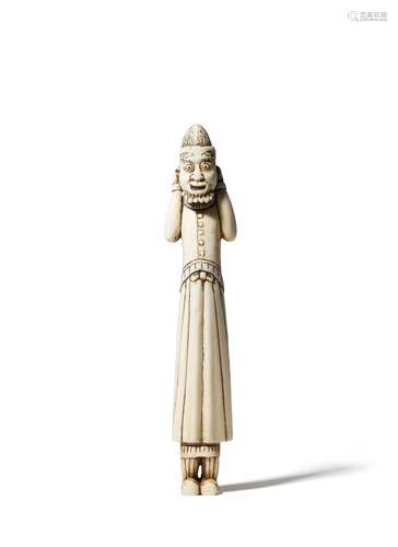 A TALL AND UNUSUAL JAPANESE IVORY NETSUKE OF A FOREIGNER EDO PERIOD, LATE 18TH OR EARLY 19TH CENTURY