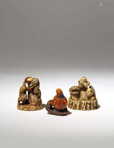 THREE JAPANESE IVORY NETSUKE EDO PERIOD AND LATER, 18TH AND 19TH CENTURY One depicting a tiger and a