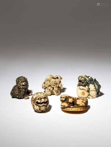 FIVE JAPANESE IVORY NETSUKE OF SHISHI EDO AND MEIJI PERIOD, 18TH AND 19TH CENTURY The lion dogs with