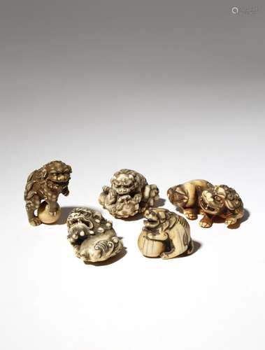 FIVE JAPANESE IVORY NETSUKE OF SHISHI EDO AND MEIJI PERIOD, 18TH AND 19TH CENTURY The lion dogs