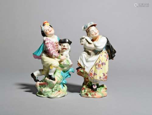 A rare pair of Derby figures of a boy and girl with a Macaroni dog and cat, c.1775, the boy half