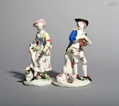 A pair of Bow figures of a Shepherd Piper and Dancing Shepherdess, c.1756, his pipes tucked under