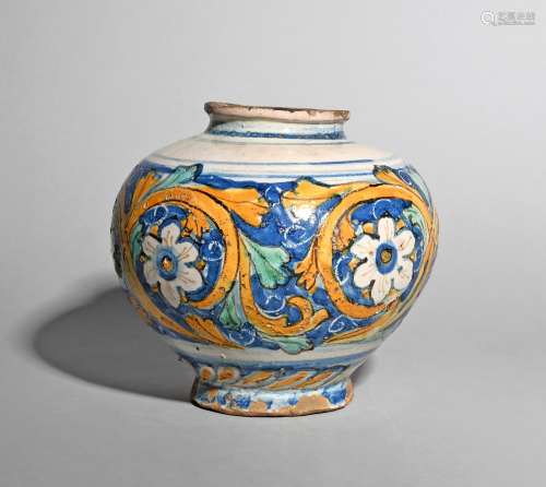 A Caltagirone (Sicily) maiolica bombola, late 17th century, brightly decorated with flowerhead