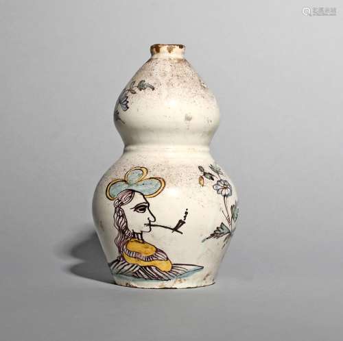 A rare Portuguese faïence bottle or flask, 2nd half 17th century, of double gourd form, painted to