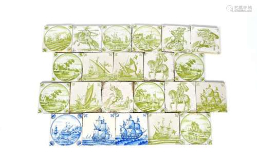 Twenty-two Delft tiles, most 19th century, three painted in blue with ships at sail, the rest in
