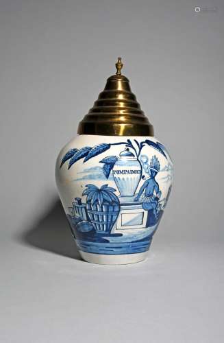 A Delft tobacco jar, 18th/19th century, painted with a native American Indian sitting on a plinth