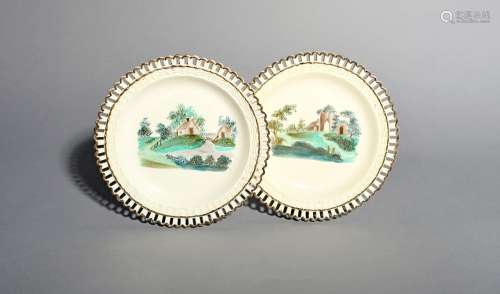 A rare pair of creamware plates, late 18th century, decorated by William Absolon of Yarmouth, each