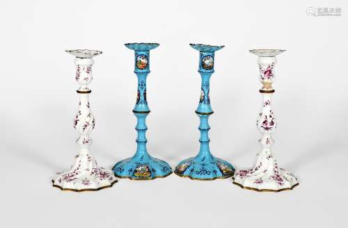 A pair of Staffordshire enamel candlesticks, c.1770, of spiral moulded form, painted in puce camaieu