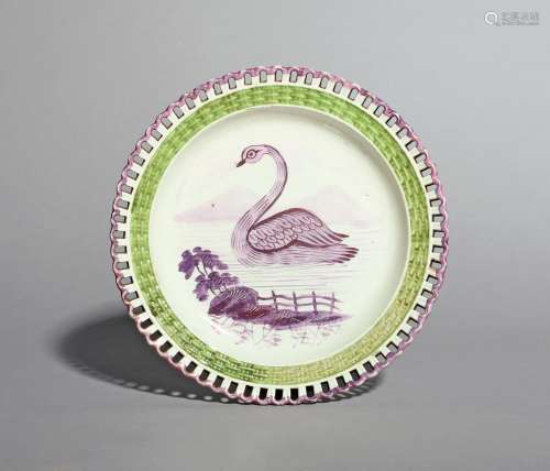 A rare Swansea pearlware plate, c.1830, painted to the well in pink and purple lustre with a swan