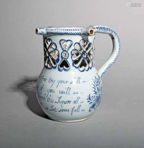 A delftware puzzle jug, c.1740-60, probably Liverpool, the rounded body inscribed with a four line