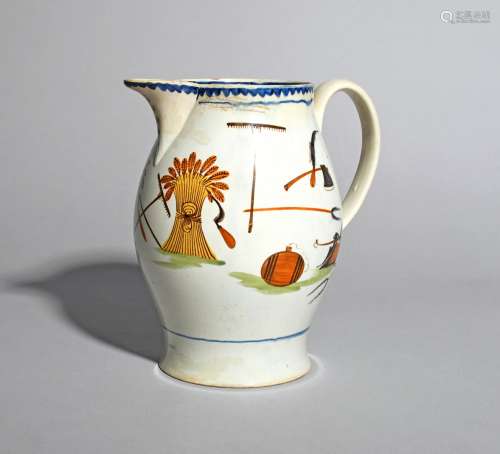 A Pratt ware harvest jug, c.1800, painted in a typical palette of yellow, ochre, green and blue with