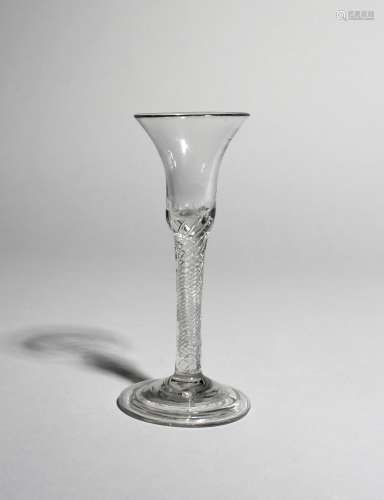 A wine glass, c.1750-60, the bell-shaped bowl raised on an airtwist stem above a folded foot, 17.