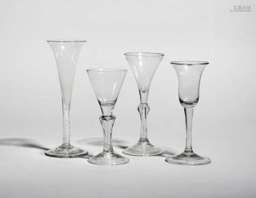 Four Continental wine glasses,, 18th century, one with a rounded funnel bowl raised on a six-sided