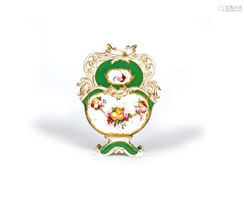 An English porcelain wall pocket, c.1830, of flattened form, painted with a garland of fruit and