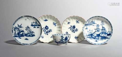 Four Lowestoft blue and white saucers and a teabowl, c.1765-80, two saucers painted with differing