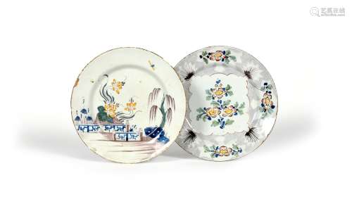 Two delftware plates, mid 18th century, one probably Wincanton and painted with a polychrome