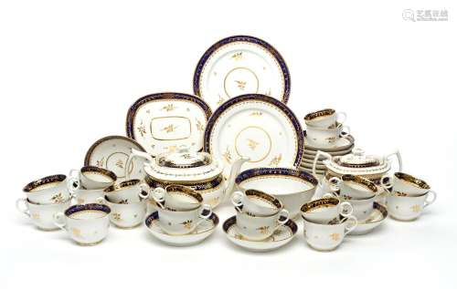 A Chamberlain's Worcester part tea service, c.1810, decorated with gilt formal foliate motifs on