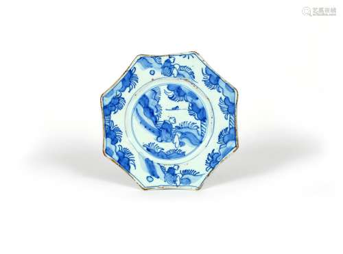 A small delftware octagonal plate, c.1690, probably London, painted in blue with a Chinese figure