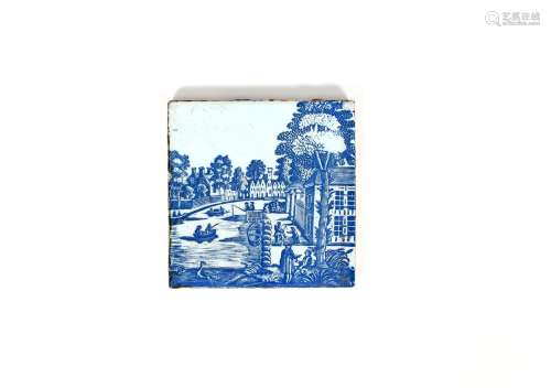 A Liverpool delftware woodblock tile, c.1760, printed in blue by John Sadler with a Dutch canal