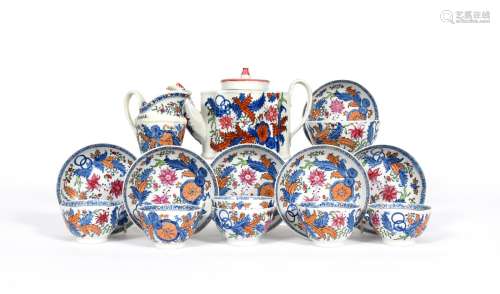 A New Hall part tea service, c.1790-1800, boldly decorated in pattern 272 with large flower sprays