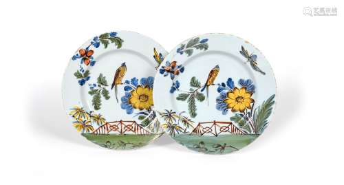 A good pair of Bristol delftware chargers, c.1740-60, well decorated in polychrome enamels with a
