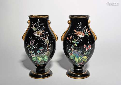 A pair of black glass enamelled vases, 2nd half 19th century, of flattened baluster form, painted