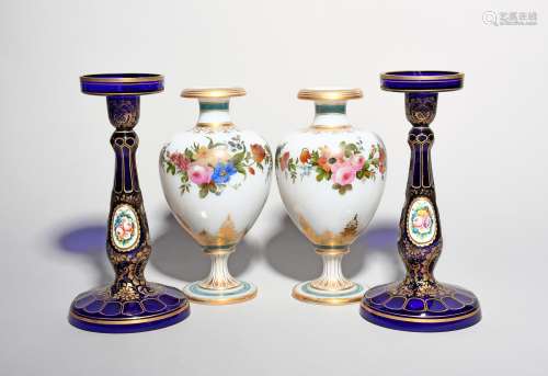 A pair of Bohemian opaline glass vases, 19th century, each painted with a continuous band of flowers