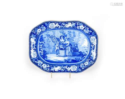 A large Staffordshire blue and white transferware charger, 19th century, the elongated octagonal