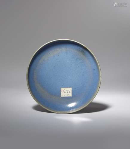 A CHINESE JUN-TYPE DISH QING DYNASTY Coated in a crackled blue glaze with hints of lavender, the
