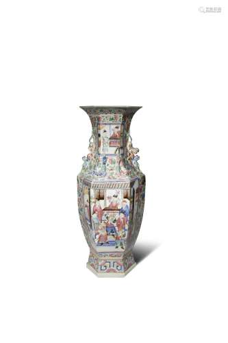 A LARGE CHINESE CANTON FAMILLE ROSE HEXAGONAL-SECTION VASE QING DYNASTY Decorated with two large