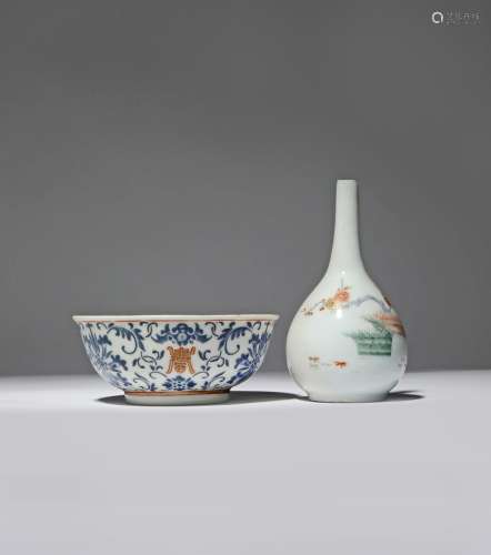 A CHINESE BLUE AND RED-ENAMELLED BOWL AND A JAPANESE KAKIEMON BOTTLE VASE LATE QING DYNASTY AND 18TH