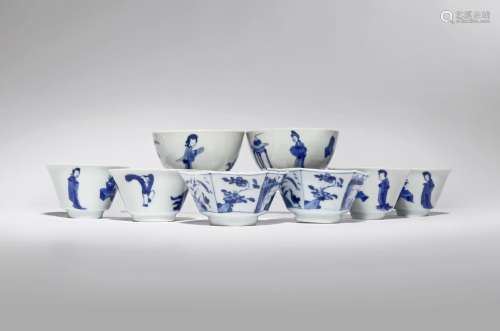 SIX SMALL CHINESE BLUE AND WHITE WINE CUPS AND A PAIR OF TEA BOWLS KANGXI 1662-1722 Comprising: a