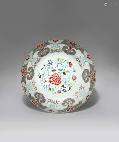 A LARGE CHINESE FAMILLE ROSE DISH QIANLONG 1736-95 The centre painted with a large spray of peony,