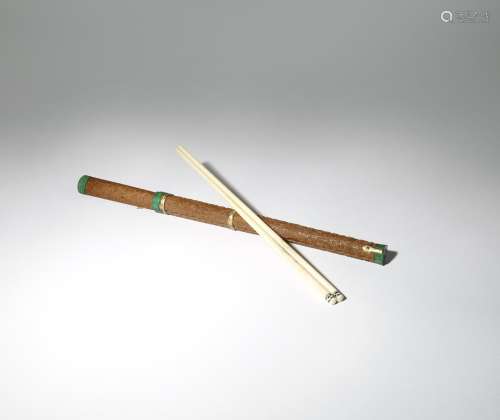 A CHINESE CHOPSTICK AND KNIFE SET QING DYNASTY The wood case with gilt-metal mounts and carved in