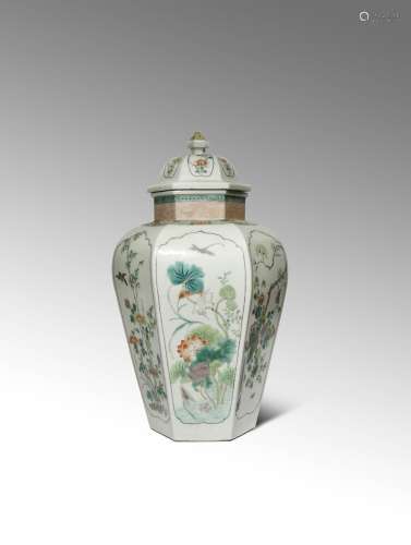 A CHINESE FAMILLE VERTE HEXAGONAL-SECTION BALUSTER VASE AND COVER 19TH CENTURY Each facet painted