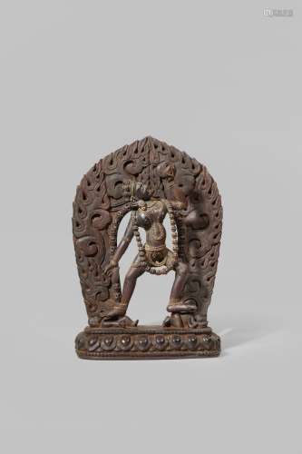 A RARE ZITAN FIGURE OF VAJRAYOGINI LATE QING DYNASTY Carved in a dynamic pose with a kapala in her