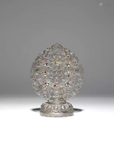 A TIBETAN SILVER BUDDHIST OFFERING 19TH CENTURY Decorated with five Buddhist emblems, the central
