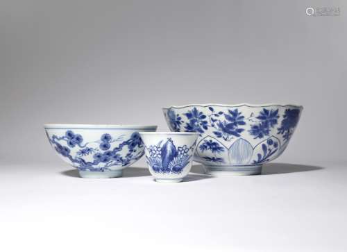 TWO CHINESE BLUE AND WHITE BOWLS AND A WINE CUP QING DYNASTY Comprising: a moulded bowl decorated
