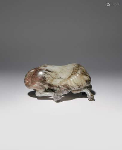 A LARGE CHINESE BROWN AND WHITE JADE CARVING OF A HORSE QING DYNASTY OR LATER The horse depicted