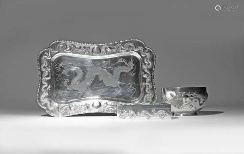 THREE CHINESE SILVER ITEMS DECORATED WITH DRAGONS 2ND HALF 19TH CENTURY Comprising: a tray with