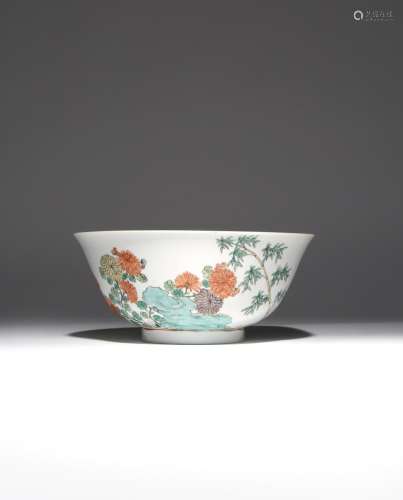 A CHINESE FAMILLE VERTE BOWL KANGXI 1662-1722 Painted in enamels with chrysanthemum, bamboo and
