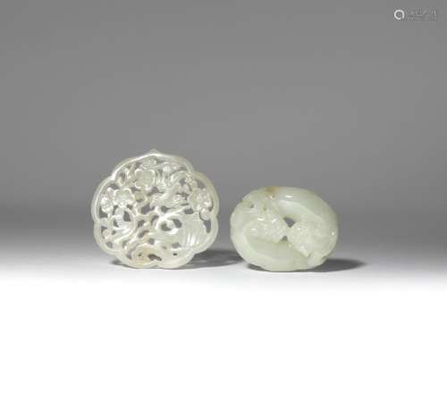 TWO SMALL CHINESE JADE CARVINGS 19TH CENTURY One formed as two chilong curled with their snouts