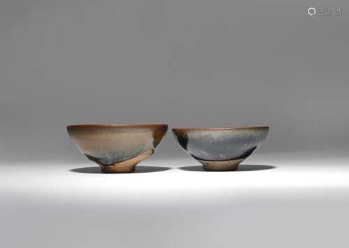 TWO CHINESE JIAN-TYPE TEA BOWLS SONG DYNASTY Each of conical form, one covered in a rich black