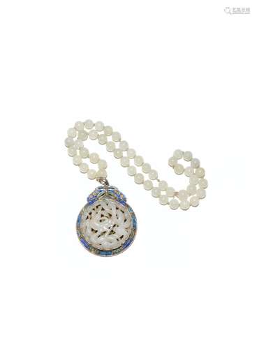 A CHINESE WHITE JADE OPENWORK 'DRAGON' PENDANT MOUNTED AS A NECKLACE 20TH CENTURY The circular