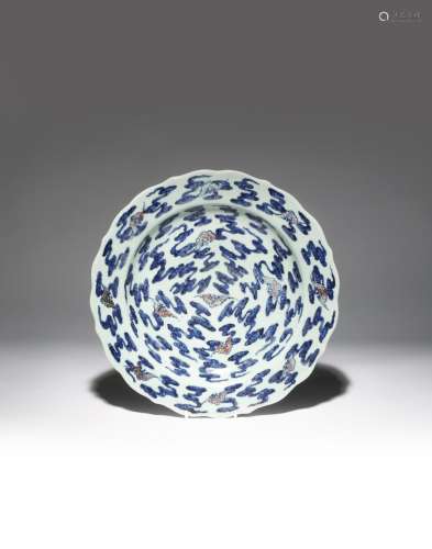 A CHINESE UNDERGLAZE BLUE AND RED CELADON-GROUND 'BATS AND CLOUDS' DISH SIX CHARACTER QIANLONG