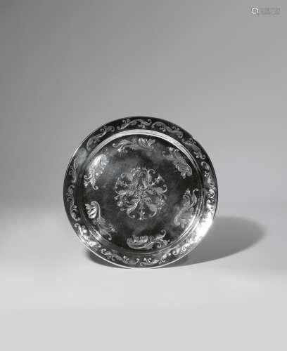 A CHINESE SILVER DISH 2ND HALF 19TH CENTURY The centre incised with blossoming flowers and buds