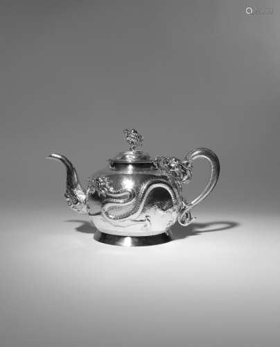 A CHINESE SILVER 'FIVE DRAGON' TEAPOT 2ND HALF 19TH CENTURY The ovoid body decorated in repoussι