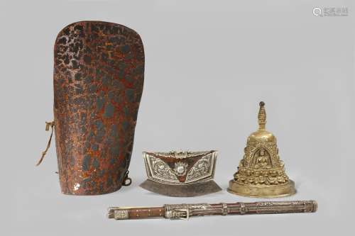 A COLLECTION OF TIBETAN ITEMS 15TH CENTURY AND LATER Comprising: a brass stupa, a small purse, a